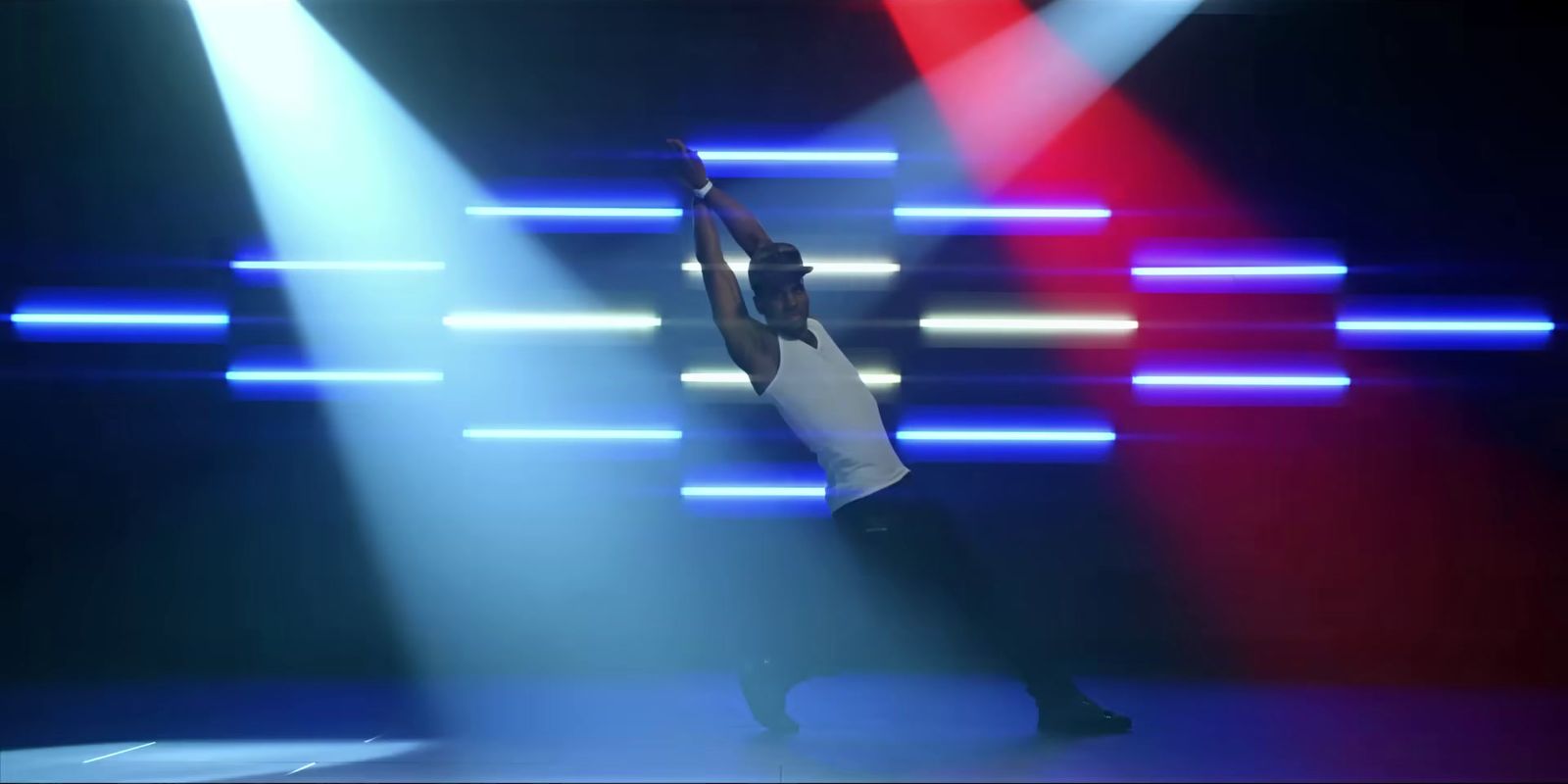 a person on a stage doing a handstand