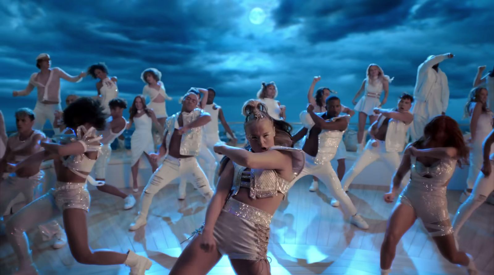 a group of women dancing on a stage