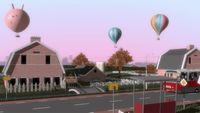 a computer generated image of a town with hot air balloons in the sky