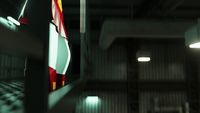 a hallway with a flag hanging from the ceiling