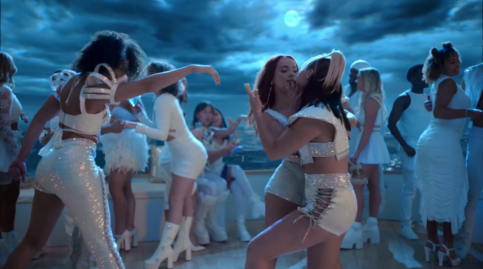 a group of women dancing on a dance floor