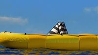 a man floating on top of a yellow raft in the ocean