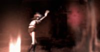 a blurry photo of a person holding a baseball bat