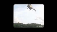 a helicopter that is flying through the air