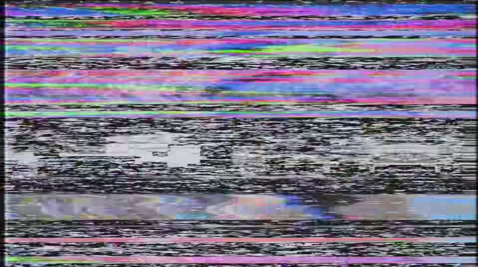 a television screen with a multicolored pattern on it