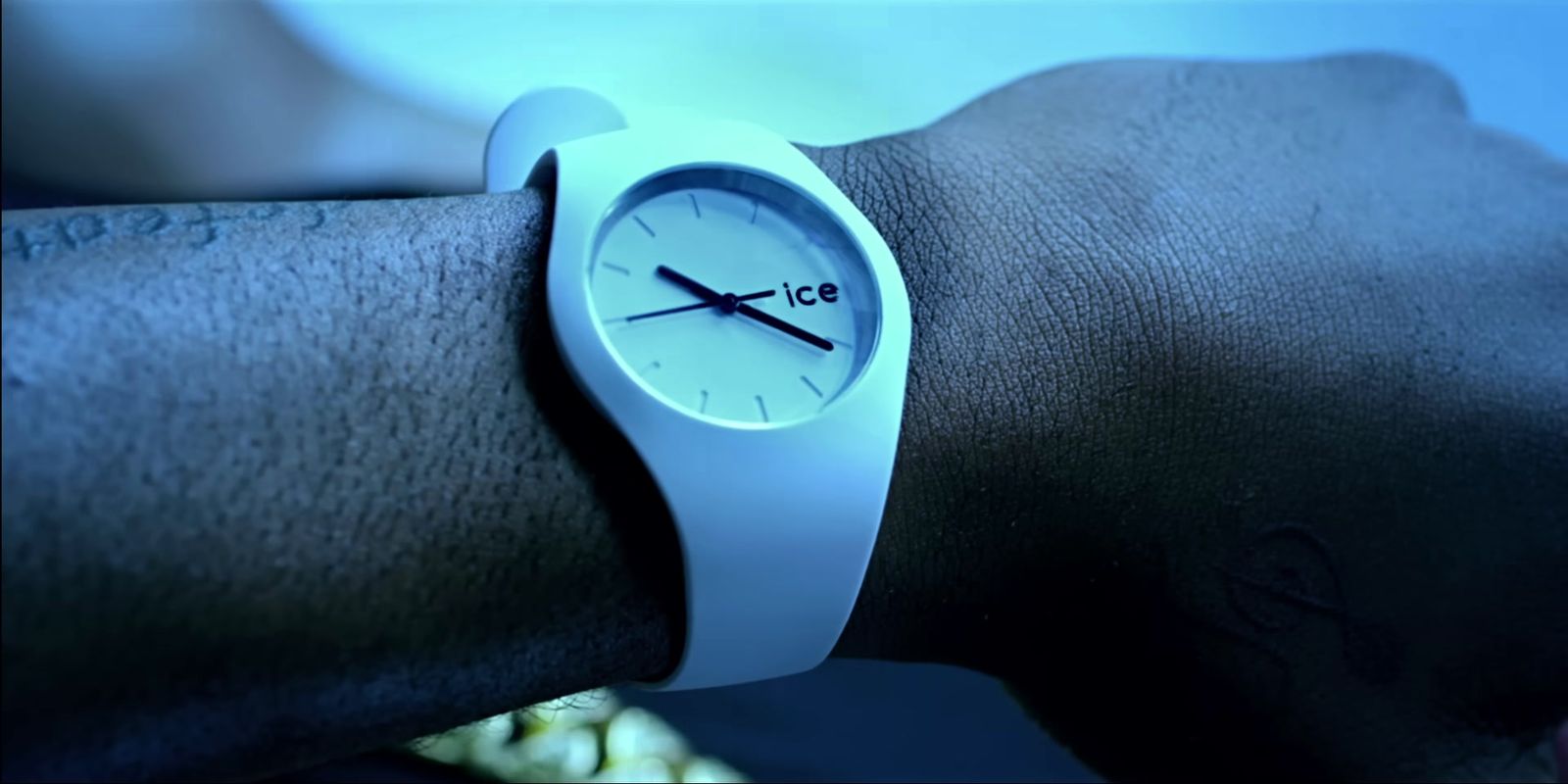 a close up of a person wearing a wrist watch