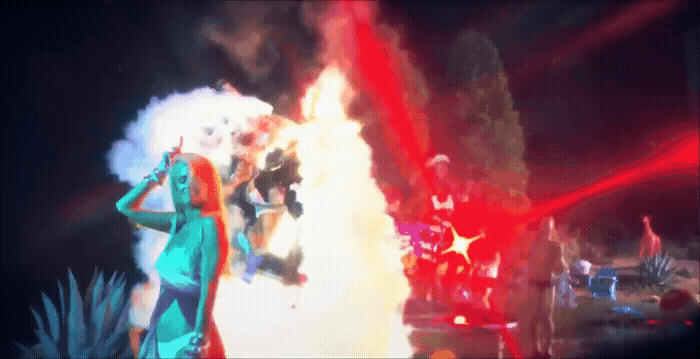 a woman standing in front of a fire with her hands on her head