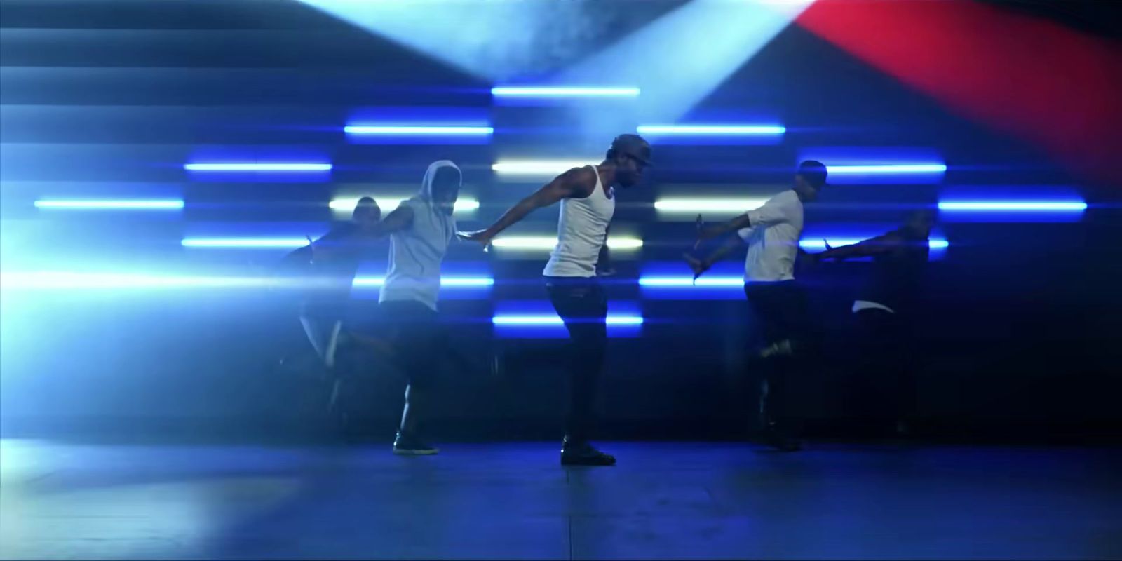 a group of people standing on top of a stage