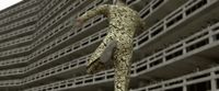 a man in a suit jumping in front of a building