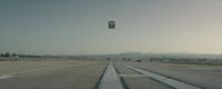 a view of an empty runway from a plane