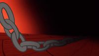 a large metal chain with a red background