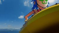 a cartoon character riding on top of a yellow boat