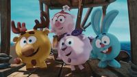 a group of animated characters standing on a dock