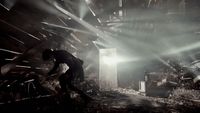 a man standing in a room with lots of debris