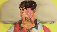 a painting of a man's face covered in sprinkles