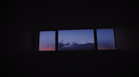 a view of the sky from a window at night