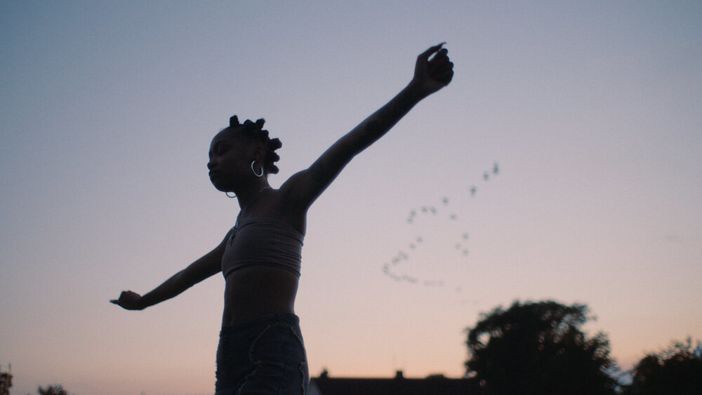 a man is throwing a frisbee in the air