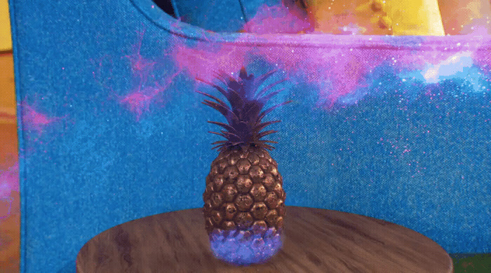 a pineapple sitting on top of a wooden table