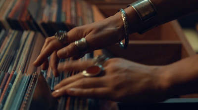 a close up of a person holding a record