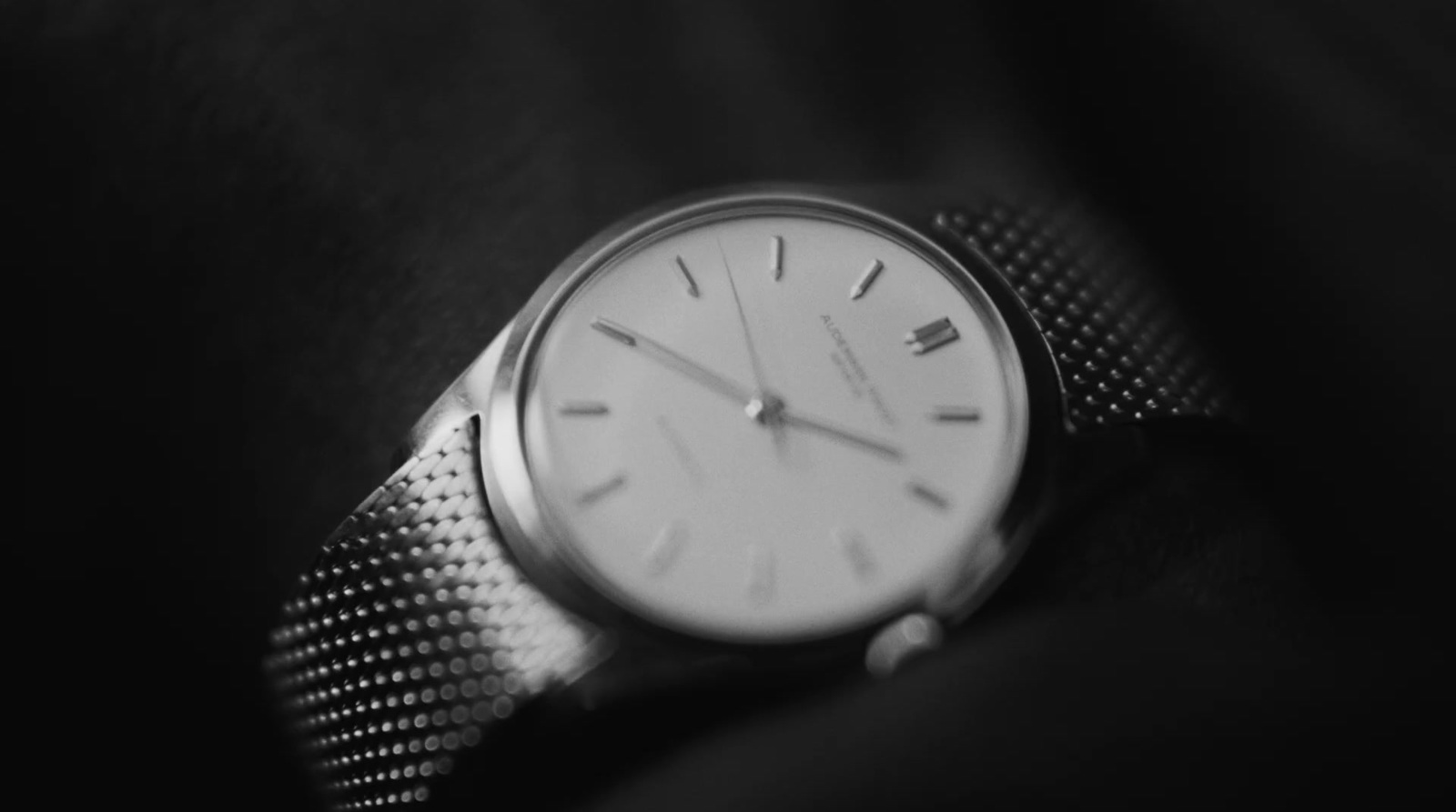 a close up of a watch on a person's wrist