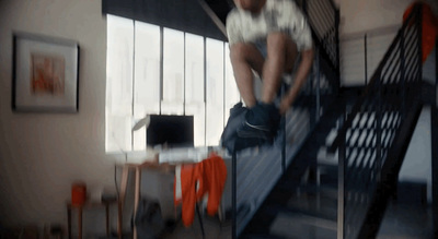 a man climbing up a flight of stairs