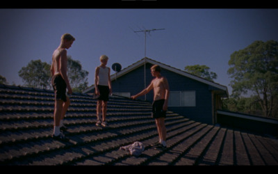 a group of men standing on top of a set of stairs