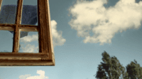 a picture of a window with a sky in the background