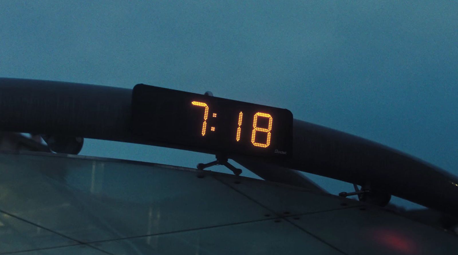 a close up of a clock on a building