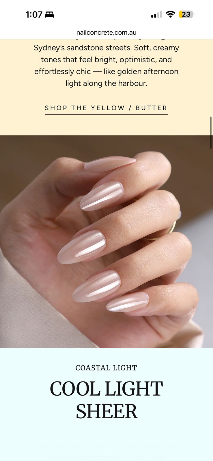 a woman's hand with long, shiny nails