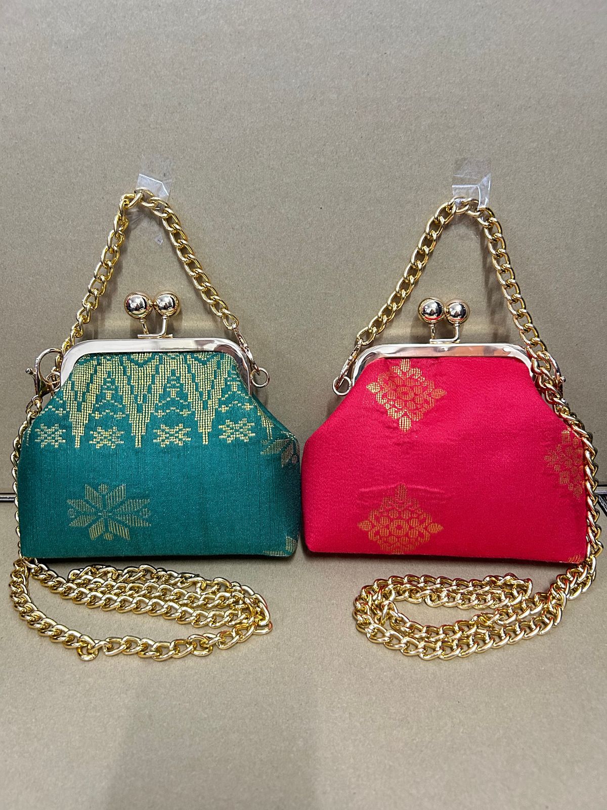 a pair of purses sitting on top of a table