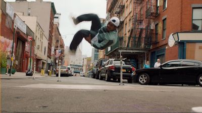 a man flying through the air while riding a skateboard