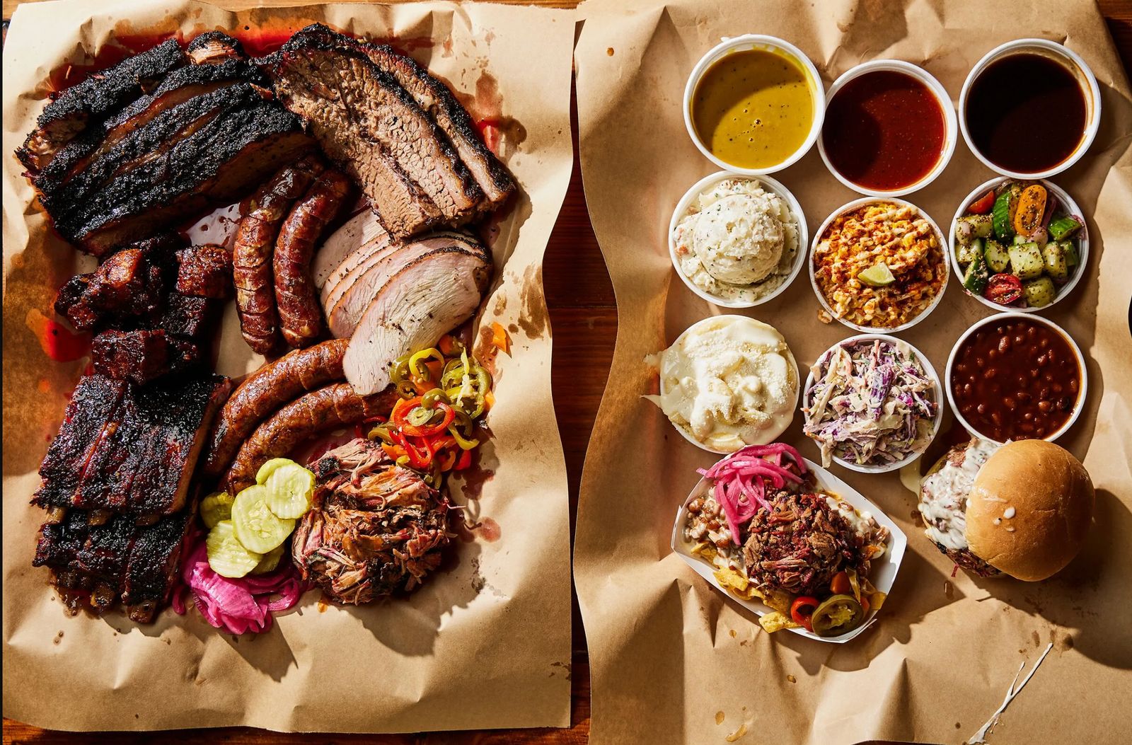 two trays of barbecue ribs, coleslaw, coleslaw, cole