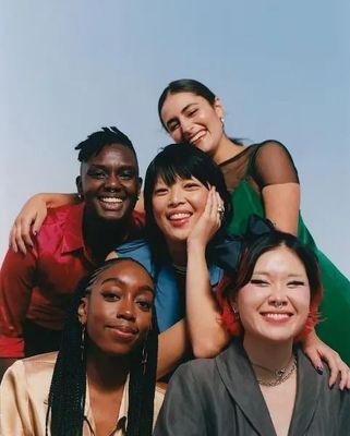 a group of people posing for a picture