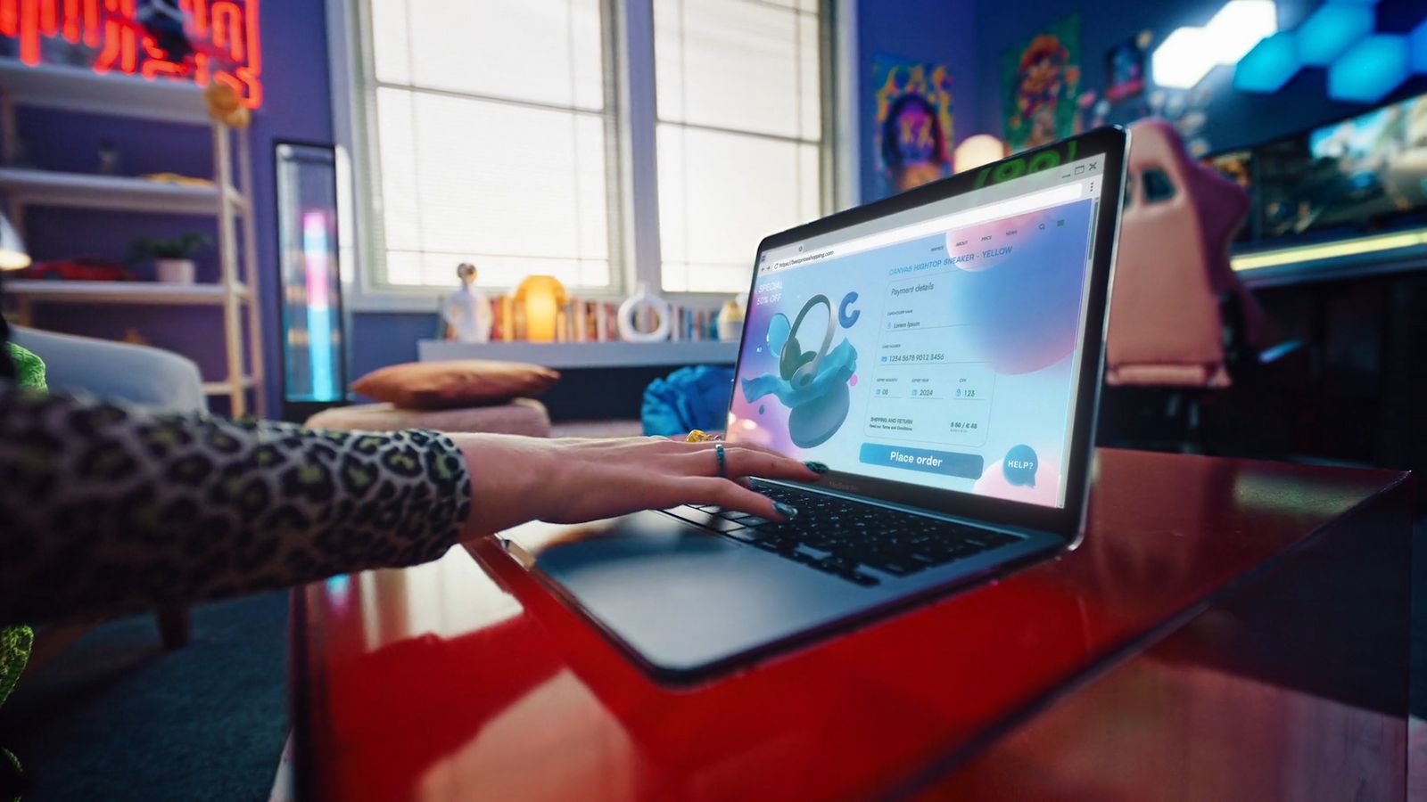 a person using a laptop computer on a desk