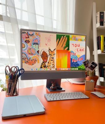 a desktop computer sitting on top of a desk