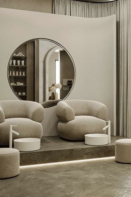 a living room with a large round mirror on the wall