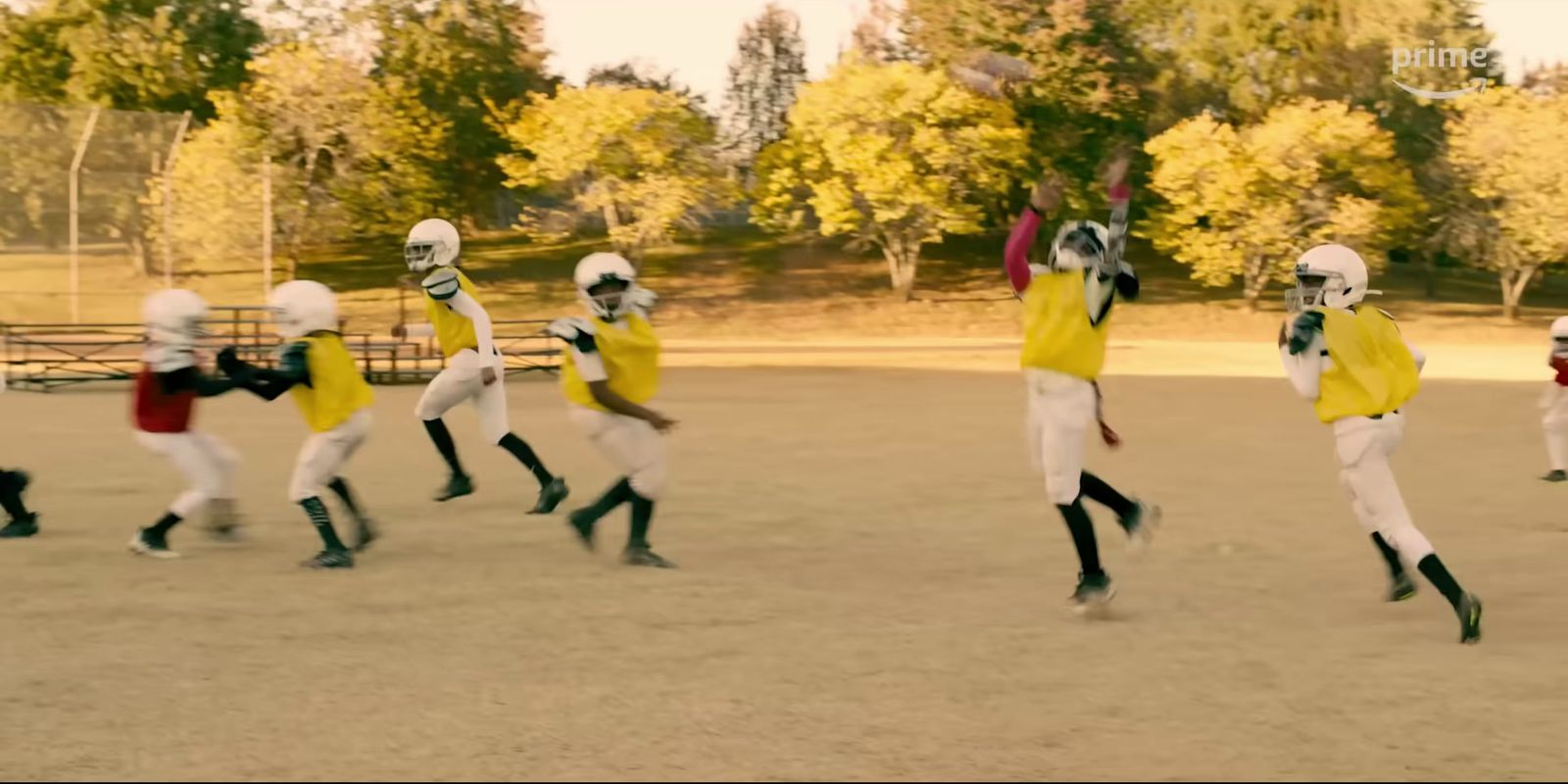 a group of young men playing a game of football