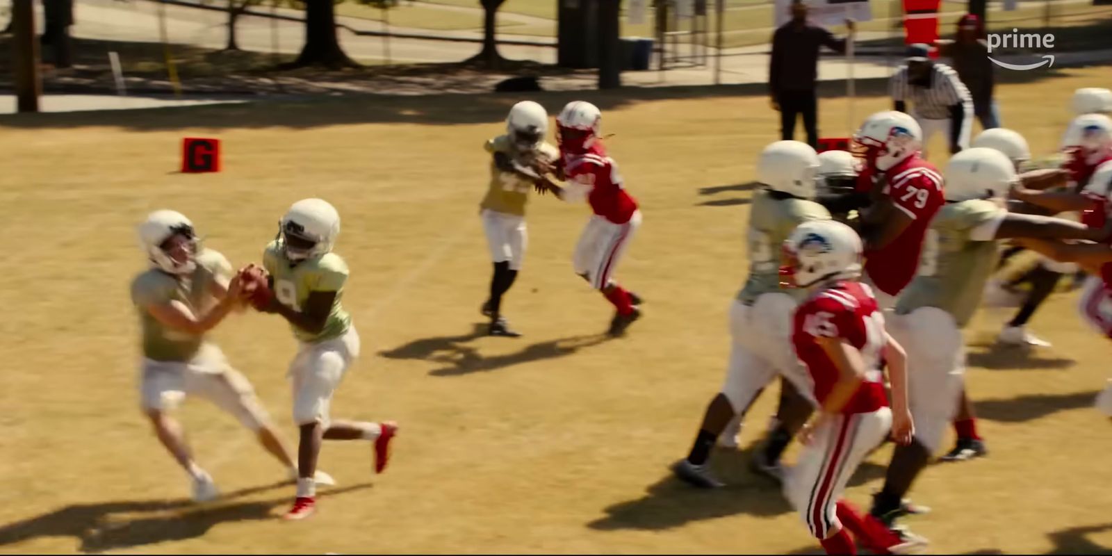 a group of young men playing a game of football