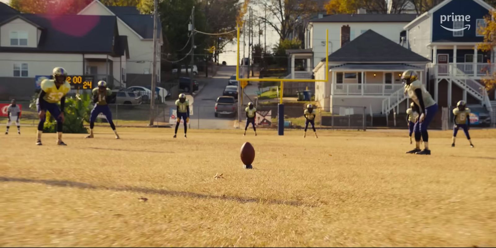 a group of people playing a game of football