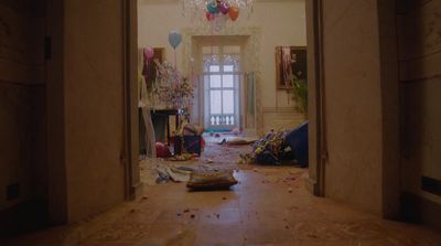 a room that has a bunch of balloons on the floor