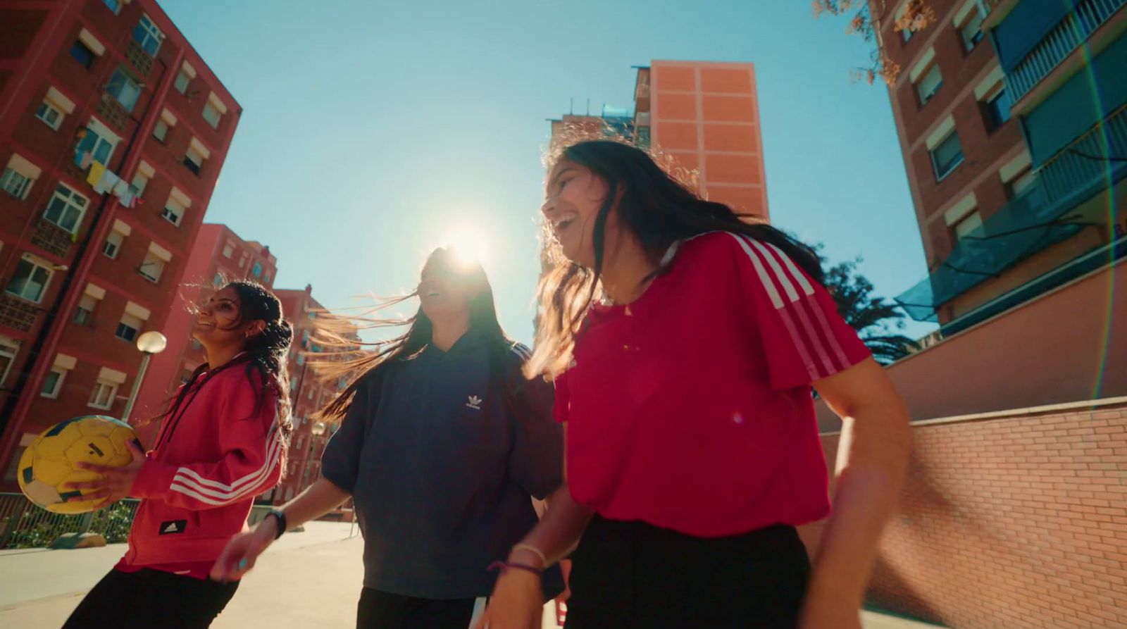 a group of young people standing next to each other