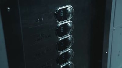 a close up of a metal door with numbers on it