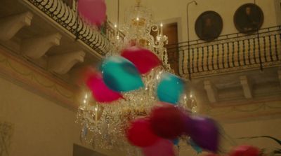 a chandelier hanging from a ceiling in a room