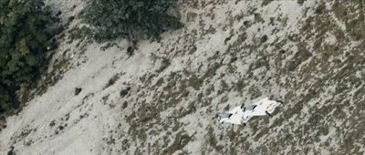 an aerial view of a plane that is on the ground