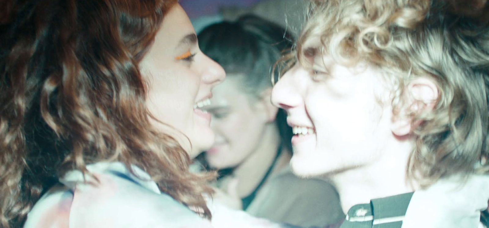 a couple of women standing next to each other