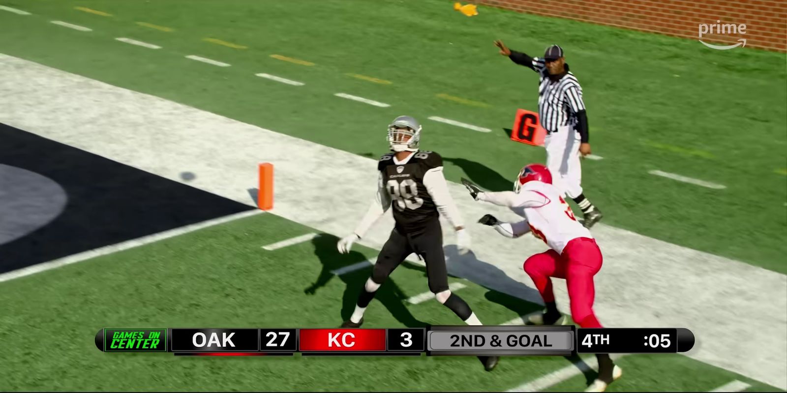 a football player throwing a ball to another player