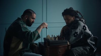 a man and a woman playing a game of chess