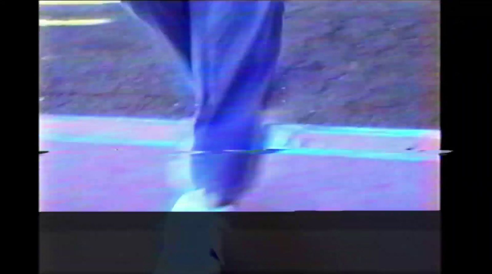 a blurry image of a person walking on a sidewalk