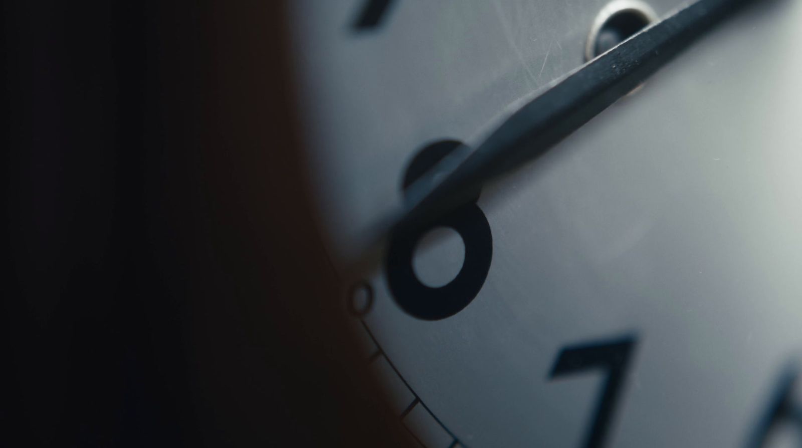 a close up of a clock face showing the time