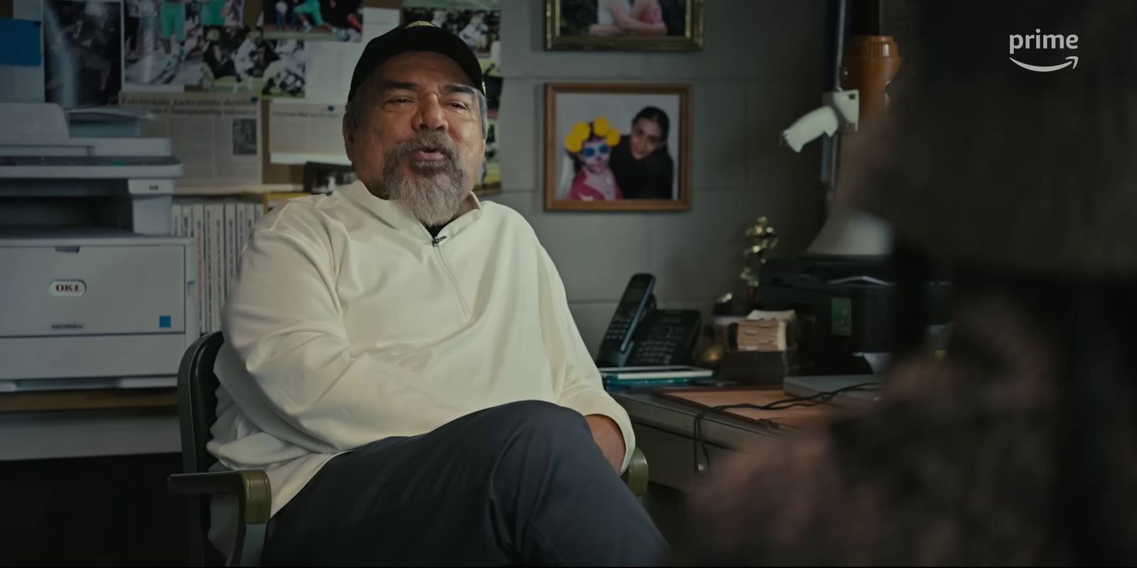 a man sitting at a desk in an office